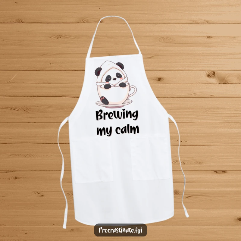 Funny Panda Tea Time Apron: A panda in a bathrobe relaxes in a teacup, designed for calm and humorous cooking.