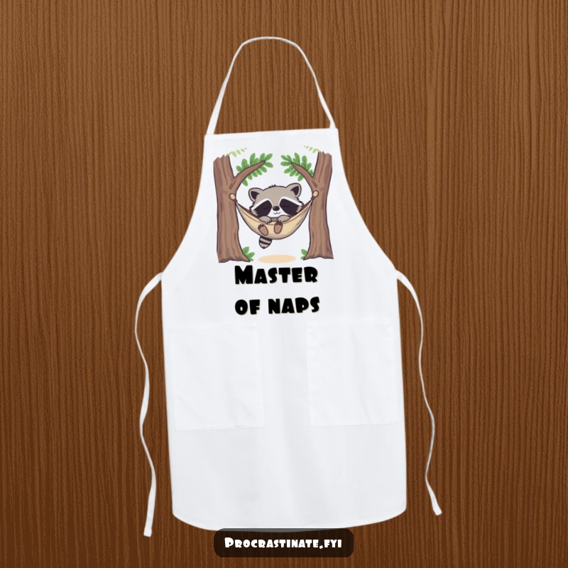 Funny happy raccoon deeply asleep in a cozy hammock strung between two trees, looking utterly content on this practical kitchen apron.
