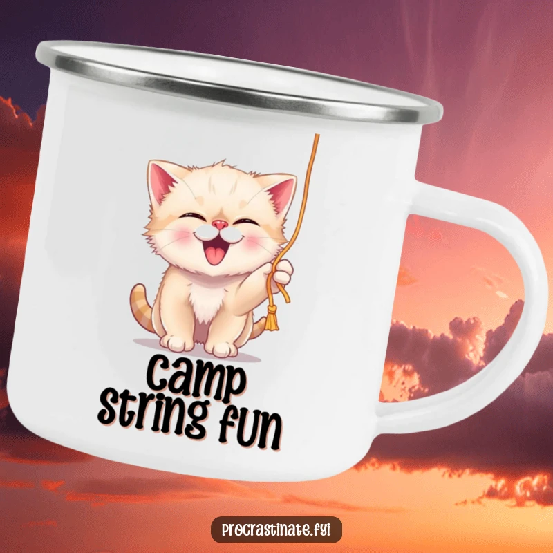 Funny giggling kitten playfully batting at a dangling string of yarn, depicted on a rugged camping mug.