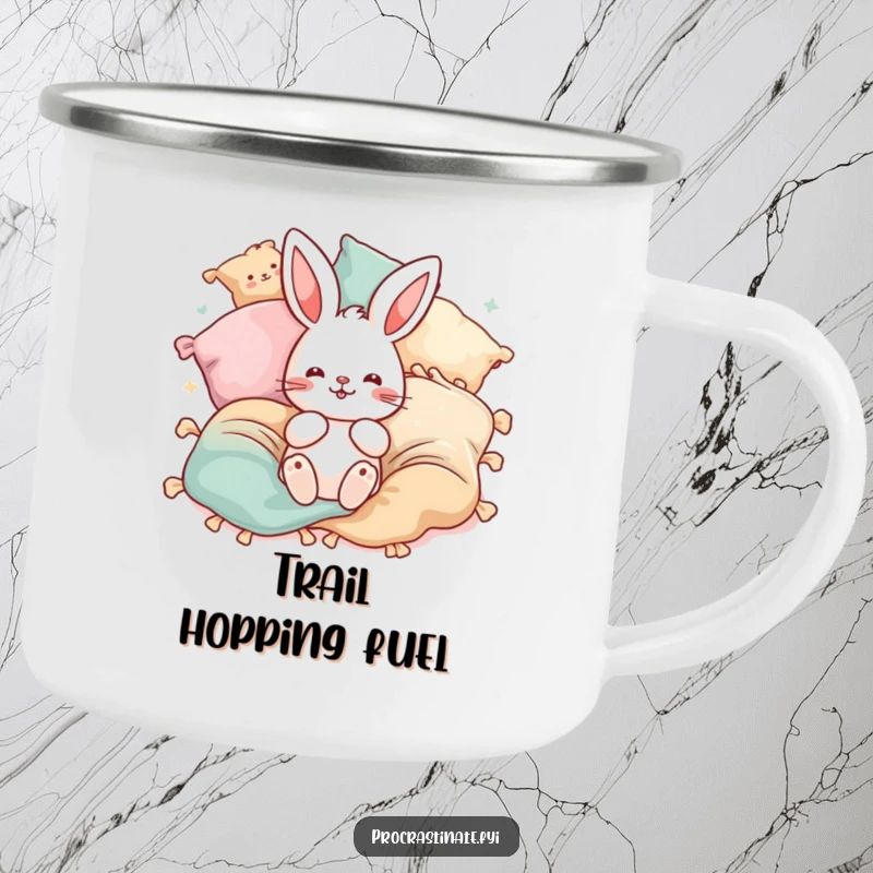Funny bunny pillow camping mug showing a playful bunny surrounded by bouncing blankets and pillows. Outdoor playfulness.