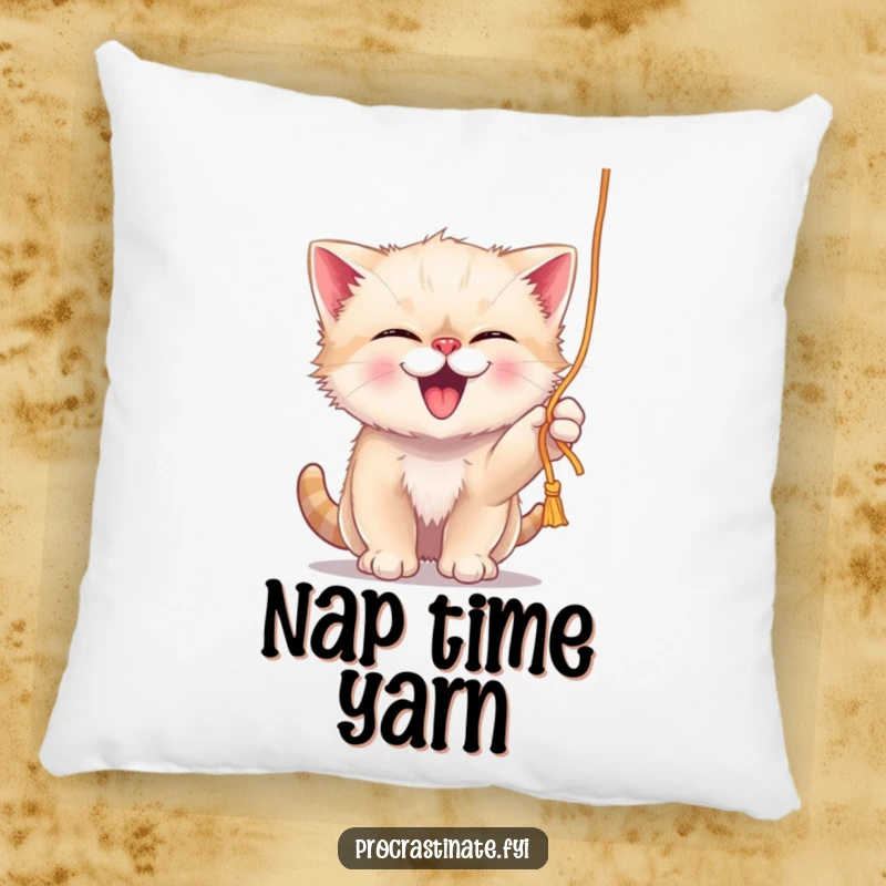 Funny giggling kitten playfully batting at a dangling string of yarn, printed on a cozy and decorative pillow.