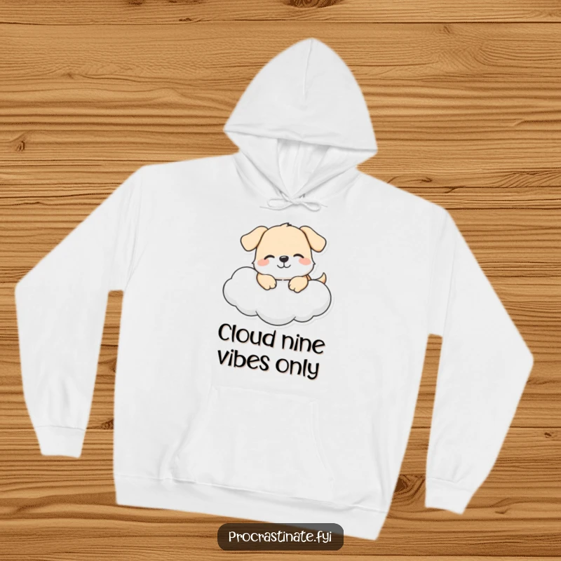Funny dog hoodie showing a happy dog character blissfully lounging on a soft cloud, perfect for cozy days and cheerful vibes.