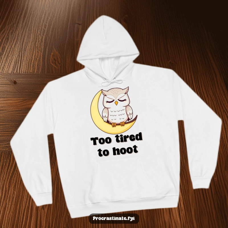 Funny owl hoodie featuring a dazed, sleepy owl on a moon, perfect for expressing sleepy vibes and humor.
