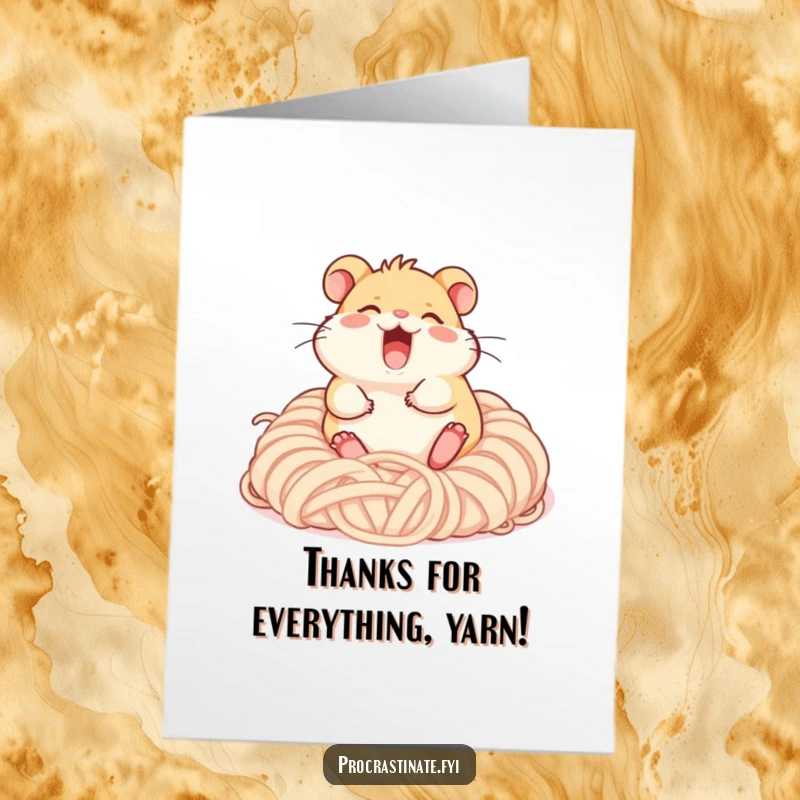 Funny free printable thank you card: a hamster character giggling joyfully amidst a pile of soft, colorful yarn.