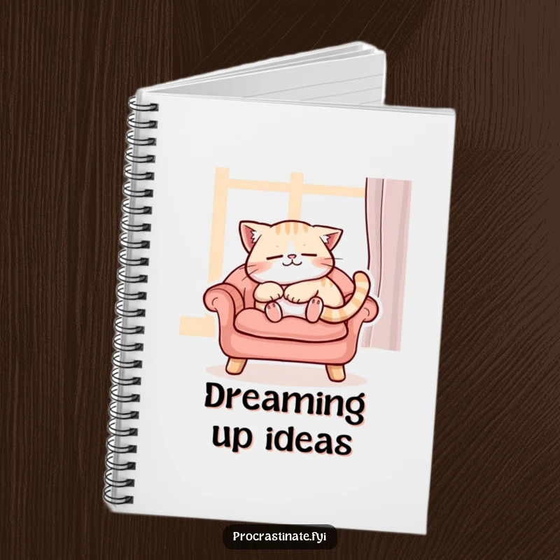 Funny content cat character purring while napping peacefully on a cushioned chair, a lined notebook for peaceful thoughts.