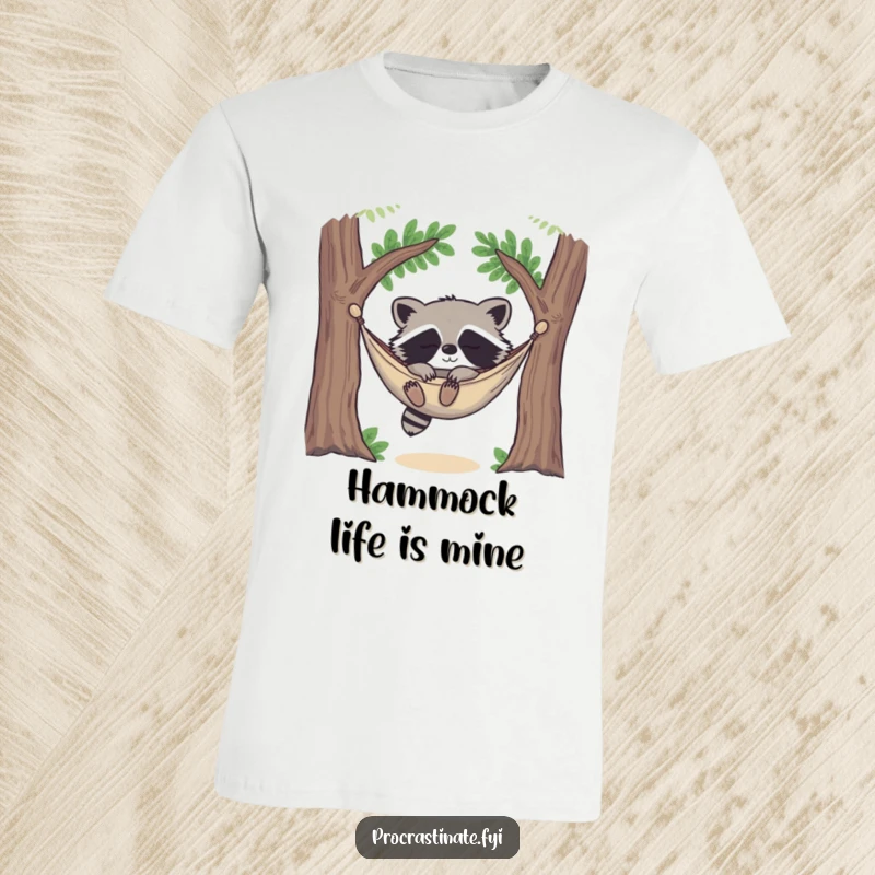 Funny happy raccoon deeply asleep in a cozy hammock strung between two trees, looking utterly content on this T-shirt.