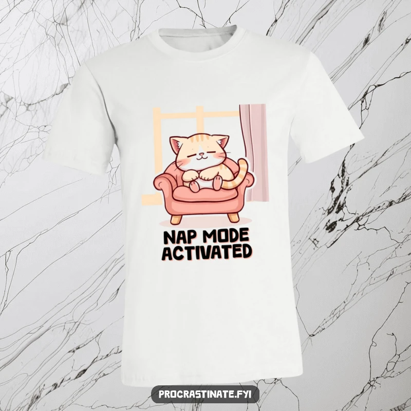 Funny content cat character purring while napping peacefully on a cushioned chair, a soft and funny t-shirt for cat moms.