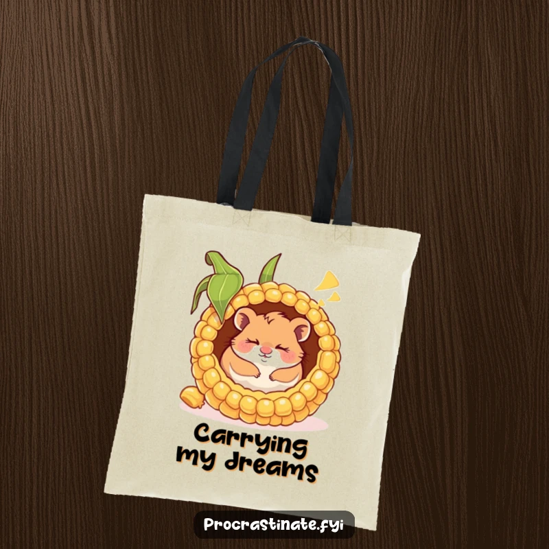 Funny tote bag featuring a happy hamster napping inside a giant corn cob, smiling in its sleep, perfect for carrying daily items.